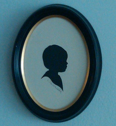 silhouette of a child in a frame